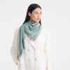 La Médaille Longchamp Shawl La Médaille Longchamp Shawl